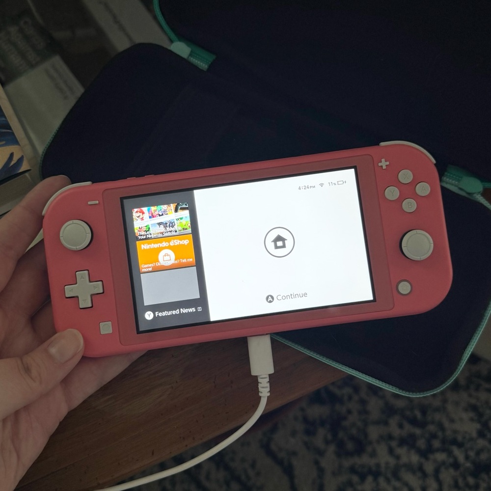 Nintendo Switch Coral Lite and Case
